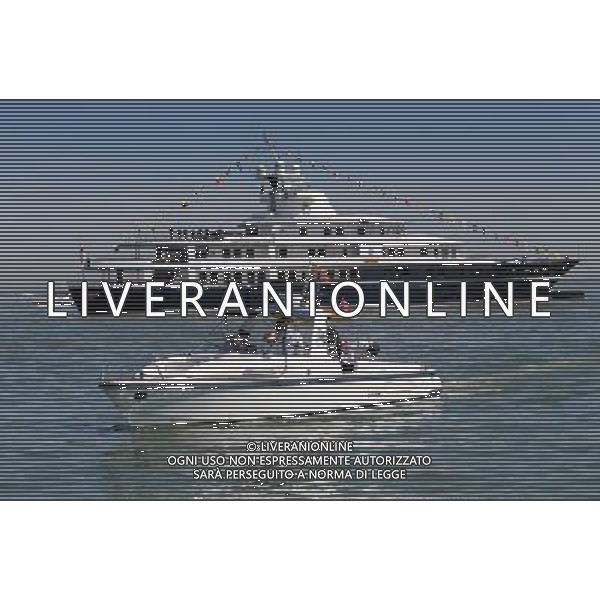 COWES, ENGLAND - JULY 25: Queen Elizabeth II and Prince Philip, Duke of Edinburgh leaves the ship Leander on the tender as she heads in to Cowes during her Diamond Jubilee visit to the Isle of Wight on July 25, 2012 in Cowes, England. The Queen and Duke of Edinburgh\'s visit to the Isle of Wight is the final stop on her Diamond Jubilee tour of the country during which she has visited 10 regions in the UK over 25 days and conducted 83 public engagements. photoshot/ALDO LIVERANI ITALY ONLY