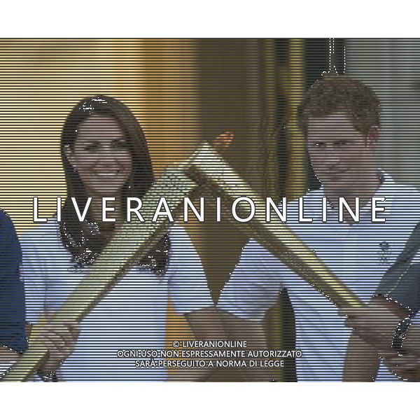 (1805201cl) Catherine Duchess of Cambridge and Prince Harry Olympic Torch Relay passes through Buckingham Palace, London, Britain - 26 Jul 2012 PHOTOSHOT/AG ADO LIVERANI SAS - ITALY ONLY -