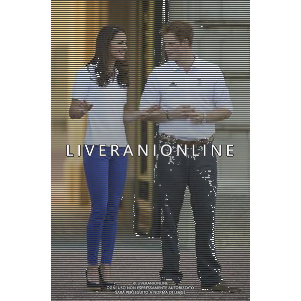 (1805201cc) Catherine Duchess of Cambridge and Prince Harry Olympic Torch Relay passes through Buckingham Palace, London, Britain - 26 Jul 2012 PHOTOSHOT/AG ADO LIVERANI SAS - ITALY ONLY -
