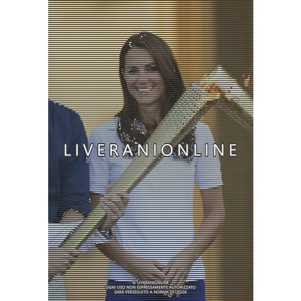 (1805201cm) Catherine Duchess of Cambridge Olympic Torch Relay passes through Buckingham Palace, London, Britain - 26 Jul 2012 PHOTOSHOT/AG ADO LIVERANI SAS - ITALY ONLY -