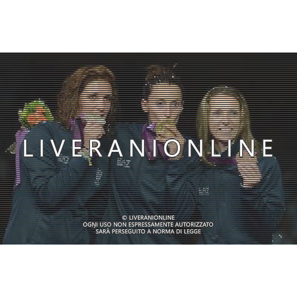 (120728) -- LONDON, July 28, 2012 () -- Elisa Di Francisca (C), Arianna Errigo (L) and Valentina Vezzali of Italy pose at the awarding ceremony of women\'s foil individual final of fencing, at the London 2012 Olympic Games in London, Britain, July 28, 2012. Francisca and her Italian teammates won the gold, silver and bronze medals respectively in this event. (/Wang Yuguo) (zgp) /photoshot/AG ALDO LIVERANI SAS - ITALY ONLY -