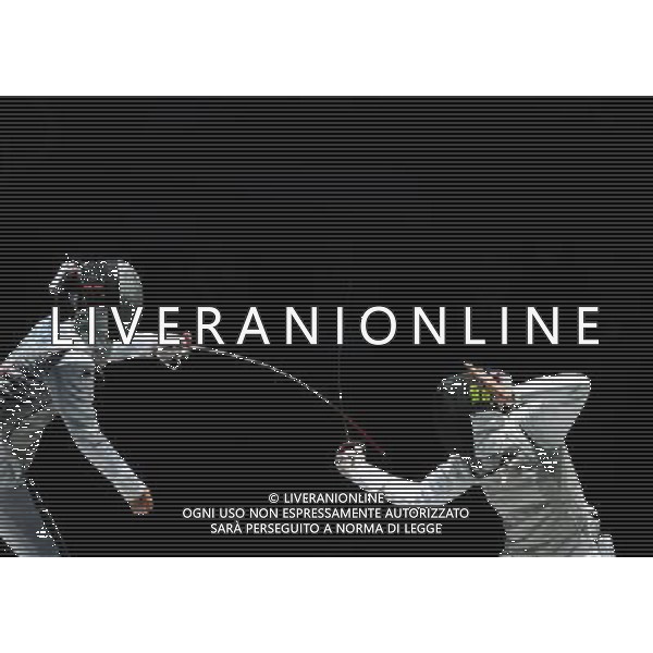 (120728) -- LONDON, July 28, 2012 () -- Elisa Di Francisca (R) of Italy reacts during women\'s foil individual final of fencing against her teammate Arianna Errigo, at the London 2012 Olympic Games in London, Britain, July 28, 2012. Francisca won the gold medal in this event. (/Zeng Yi) (zgp) photoshot/ag aldo liverani ITALY ONLY -