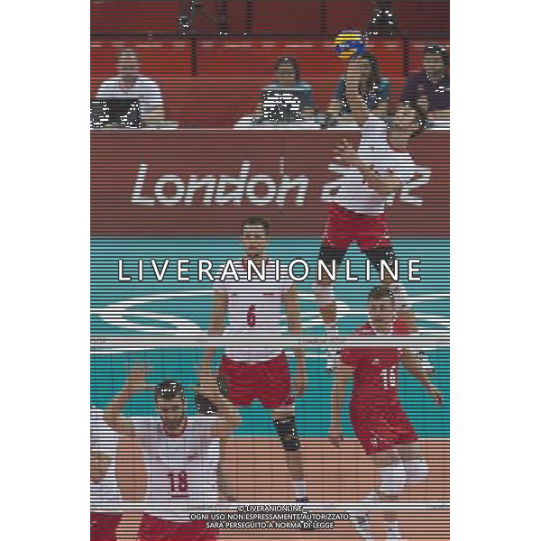 LONDYN 29.07.2012 IGRZYSKA XXX OLIMPIADY XXX LETNIE IGRZYSKA OLIMPIJSKIE LONDYN 2012 HALA EARLS COURT SIATKOWKA WLOCHY v POLSKA N Z MARCIN MOZDZONEK poland 18 BARTOSZ KUREK poland 6 LUKASZ ZYGADLO poland 15 KRZYSZTOF IGNACZAK poland 16 SEBASTIAN BOROWSKI Newspix.p THE 2012 SUMMER OLYMPIC GAMES OFFICIALLY THE GAMES OF THE XXX OLYMPIAD EARLS COURT VOLLEYBALL ITALY v POLAND --- Newspix.pl /OLIMPIADI LONDRA 2012 -AG ALDO LIVERANI SAS - ITALY ONLY *** Local Caption *** www.newspix.pl mail us: info@newspix.pl call us: 0048 022 23 22 222 --- Polish Picture Agency by Ringier Axel Springer Poland .