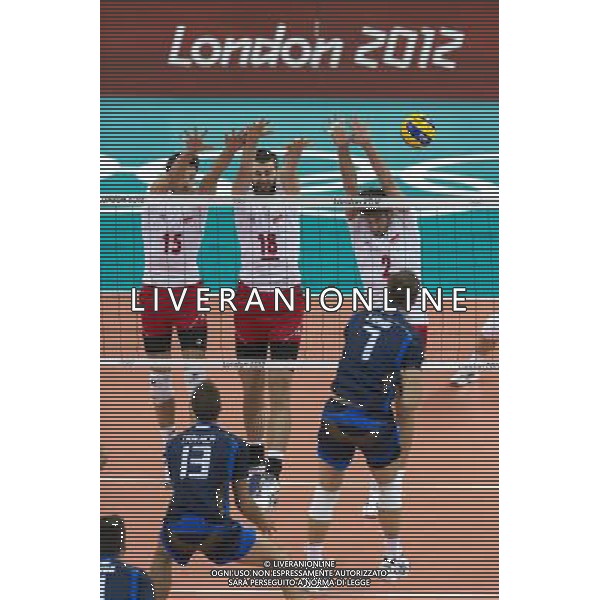 LONDYN 29.07.2012 IGRZYSKA XXX OLIMPIADY XXX LETNIE IGRZYSKA OLIMPIJSKIE LONDYN 2012 HALA EARLS COURT SIATKOWKA WLOCHY v POLSKA N Z LUKASZ ZYGADLO poland 15 MARCIN MOZDZONEK poland 18 MICHAL WINIARSKI poland 2 DRAGAN TRAVICA italy 13 MICHAL LASKO italy 7 SEBASTIAN BOROWSKI Newspix.p THE 2012 SUMMER OLYMPIC GAMES OFFICIALLY THE GAMES OF THE XXX OLYMPIAD EARLS COURT VOLLEYBALL ITALY v POLAND --- Newspix.pl /OLIMPIADI LONDRA 2012 -AG ALDO LIVERANI SAS - ITALY ONLY *** Local Caption *** www.newspix.pl mail us: info@newspix.pl call us: 0048 022 23 22 222 --- Polish Picture Agency by Ringier Axel Springer Poland .