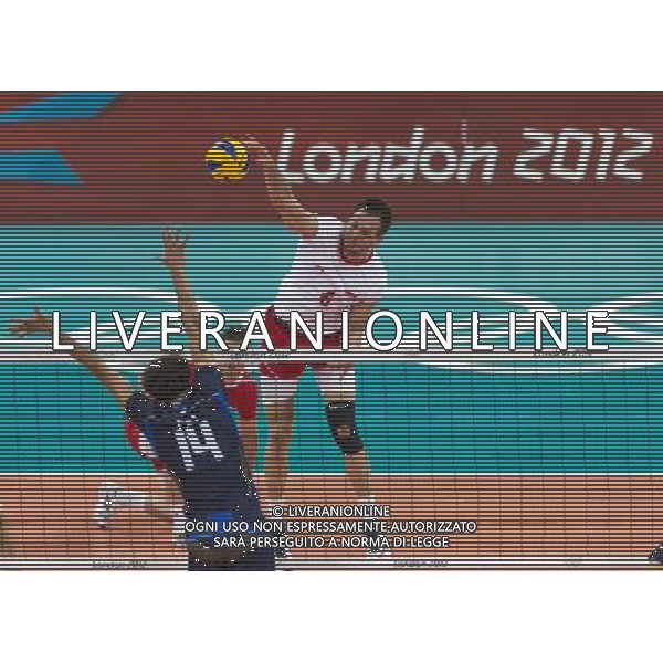 LONDYN 29.07.2012 IGRZYSKA XXX OLIMPIADY XXX LETNIE IGRZYSKA OLIMPIJSKIE LONDYN 2012 HALA EARLS COURT SIATKOWKA WLOCHY v POLSKA N Z ALESSANDRO FEI italy 14 BARTOSZ KUREK poland 6 SEBASTIAN BOROWSKI Newspix.p THE 2012 SUMMER OLYMPIC GAMES OFFICIALLY THE GAMES OF THE XXX OLYMPIAD EARLS COURT VOLLEYBALL ITALY v POLAND --- Newspix.pl /OLIMPIADI LONDRA 2012 -AG ALDO LIVERANI SAS - ITALY ONLY *** Local Caption *** www.newspix.pl mail us: info@newspix.pl call us: 0048 022 23 22 222 --- Polish Picture Agency by Ringier Axel Springer Poland .