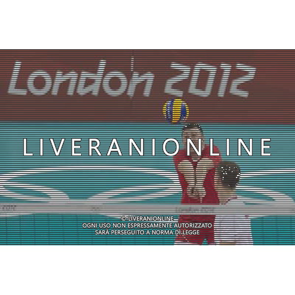 LONDYN 29.07.2012 IGRZYSKA XXX OLIMPIADY XXX LETNIE IGRZYSKA OLIMPIJSKIE LONDYN 2012 HALA EARLS COURT SIATKOWKA WLOCHY v POLSKA N Z KRZYSZTOF IGNACZAK poland 16 SEBASTIAN BOROWSKI Newspix.p THE 2012 SUMMER OLYMPIC GAMES OFFICIALLY THE GAMES OF THE XXX OLYMPIAD EARLS COURT VOLLEYBALL ITALY v POLAND --- Newspix.pl /OLIMPIADI LONDRA 2012 -AG ALDO LIVERANI SAS - ITALY ONLY *** Local Caption *** www.newspix.pl mail us: info@newspix.pl call us: 0048 022 23 22 222 --- Polish Picture Agency by Ringier Axel Springer Poland .