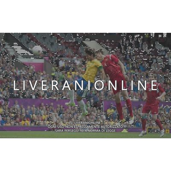 Brazil\'s ALEXANDRE PATO beats Belarus\' Igor KUZMENOK to the ball and scores his sides equalising goal to make the score 1-1 2012 London Olympics - Football - Group C - Brazil v Belarus - Sunday 29th July 2012 - Old Trafford - Manchester Œ© CameraSport - 43 Linden Ave. Countesthorpe. Leicester. England. LE8 5PG - Tel: +44 (0) 116 277 4147 - admin@camerasport.com - www.camerasport.com /ALDO LIVERANI SAS/ITALY ONLY - EDITORIAL USE ONLY