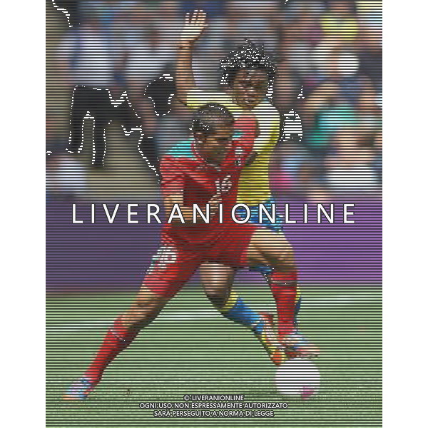Mexico\'s Miguel PONCE battles with Gabon\'s Franck ENGONGA 2012 London Olympics - Football - Group B - Mexico v Gabon - Sunday 29th July 2012 - City of Coventry Stadium - Coventry © CameraSport - 43 Linden Ave. Countesthorpe. Leicester. England. LE8 5PG - Tel: +44 (0) 116 277 4147 - admin@camerasport.com - www.camerasport.com /ALDO LIVERANI SAS/ITALY ONLY - EDITORIAL USE ONLY