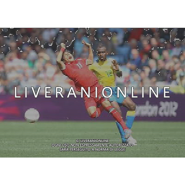 Mexico\'s Javier AQUINO battles with Gabon\'s Merlin TANDJIGORA 2012 London Olympics - Football - Group B - Mexico v Gabon - Sunday 29th July 2012 - City of Coventry Stadium - Coventry © CameraSport - 43 Linden Ave. Countesthorpe. Leicester. England. LE8 5PG - Tel: +44 (0) 116 277 4147 - admin@camerasport.com - www.camerasport.com /ALDO LIVERANI SAS/ITALY ONLY - EDITORIAL USE ONLY