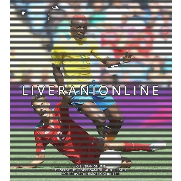 Gabon\'s Axel MEYE battles with Mexico\'s Diego REYES 2012 London Olympics - Football - Group B - Mexico v Gabon - Sunday 29th July 2012 - City of Coventry Stadium - Coventry © CameraSport - 43 Linden Ave. Countesthorpe. Leicester. England. LE8 5PG - Tel: +44 (0) 116 277 4147 - admin@camerasport.com - www.camerasport.com /ALDO LIVERANI SAS/ITALY ONLY - EDITORIAL USE ONLY