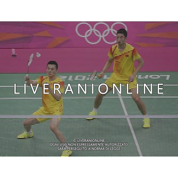 (120729) -- LONDON, July 29, 2012 () -- Chai Biao and Guo Zhendong of China competes during men\'s doubles match of badminton event against Dorian Lance James and Willem Viljoen of South Africa at London 2012 Olympic Games, London, Britain, July 29, 2012. Chai Biao and Guo Zhendong won the match 21-8, 21-13. (/Tang Shi) /ALDO LIVERANI SAS-ITALY ONLY - EDITORIAL USE ONLY