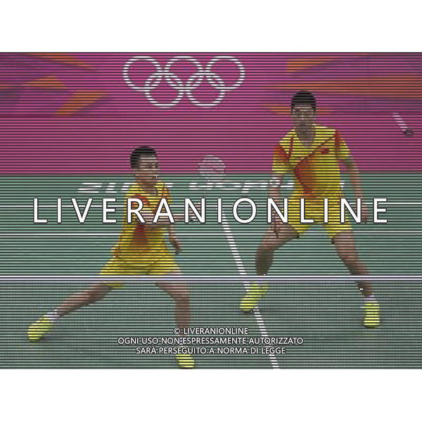 (120729) -- LONDON, July 29, 2012 () -- Chai Biao and Guo Zhendong of China competes during men\'s doubles match of badminton event against Dorian Lance James and Willem Viljoen of South Africa at London 2012 Olympic Games, London, Britain, July 29, 2012. Chai Biao and Guo Zhendong won the match 21-8, 21-13. (/Tang Shi) /ALDO LIVERANI SAS-ITALY ONLY - EDITORIAL USE ONLY