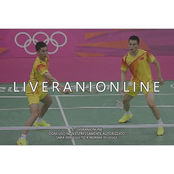 (120729) -- LONDON, July 29, 2012 () -- Chai Biao and Guo Zhendong of China competes during men\'s doubles match of badminton event against Dorian Lance James and Willem Viljoen of South Africa at London 2012 Olympic Games, London, Britain, July 29, 2012. Chai Biao and Guo Zhendong won the match 21-8, 21-13. (/Tang Shi) /ALDO LIVERANI SAS-ITALY ONLY - EDITORIAL USE ONLY