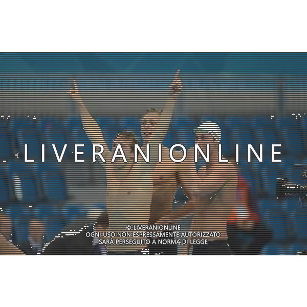 (120729) -- LONDON, July 29, 2012 () -- Members of the French team celebrate after winning in men\'s swimming 4x100m freestyle relay final contest, at London 2012 Olympic Games in London, Britain, on July 29, 2012. The French team won gold medal. (/Yang Zongyou) (nxl) /ALDO LIVERANI SAS-ITALY ONLY - EDITORIAL USE ONLY