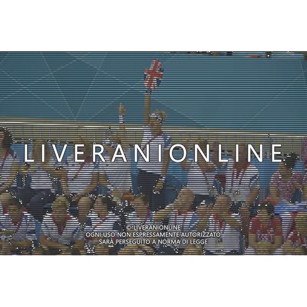 Britain\'s Tom Daley and Pete Waterfield partake in the men\'s synchronised 10m platform diving event held at the Aquatics Centre Olympic Park, Stratford, London Photo Show:- Tom Daley\'s friend Tom British diver Tonia Couch stands to cheer on the British Divers.. AG ALDO LIVERANI S A S ONLY ITALY