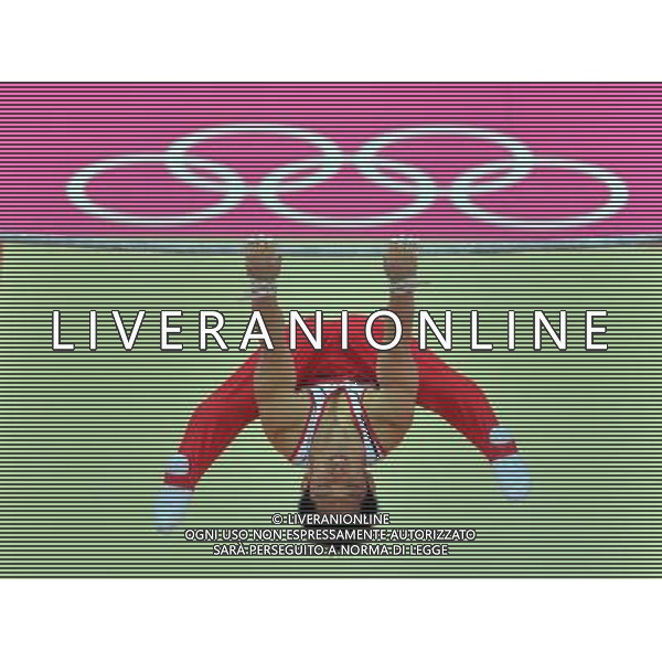 (120730) -- LONDON, July 30, 2012 () -- Kazuhito Tanaka of Japan competes in Horizontal Bar event during Gymnastics Artistic men\'s team final contest, at London 2012 Olympic Games in London, Britain, on July 30, 2012. The Japanese team won silver medal. (/Cheng Min) (nxl) AG ALDO LIVERANI S A S ONLY ITALY