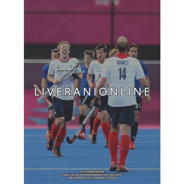 (120730) -- LONDON, July 30, 2012 () -- Barry Middleton (L) of Britain laughs during men\'s hockey preliminary match between Britain and Argentina, at London 2012 Olympic Games in London, Britain, on July 30, 2012. Britain defeated Argentina 4-1. (/Liao Yujie) (nxl) AG ALDO LIVERANI S A S ONLY ITALY