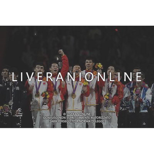 (120730) -- LONDON, July 30, 2012 () -- Chinese gymnasts celebrate during the victory ceremony after Gymnastics Artistic men\'s team final contest, at London 2012 Olympic Games in London, Britain, on July 30, 2012. The Chinese team won gold medal. (/Wang Jianhua) (nxl) AG ALDO LIVERANI S A S ONLY ITALY
