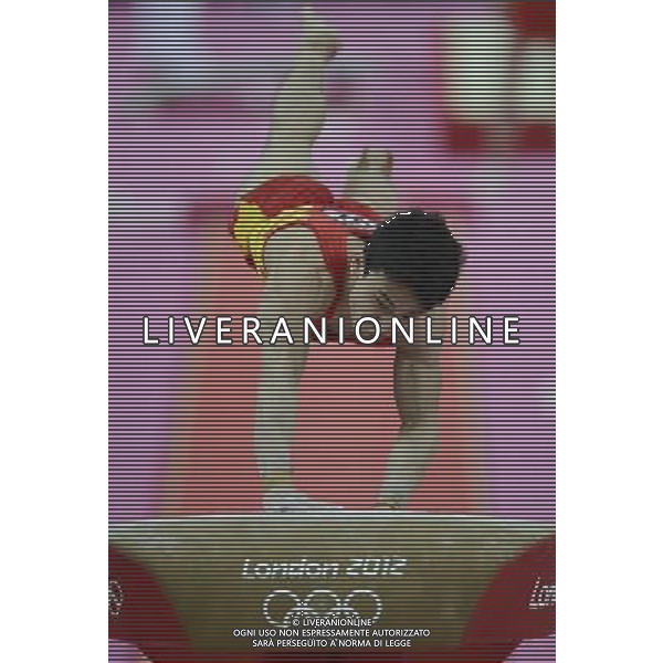 (120730) -- LONDON, July 30, 2012 () -- Chinese gymnast Feng Zhe takes part in Vault event during Gymnastics Artistic men\'s team final contest, at London 2012 Olympic Games in London, Britain, on July 30, 2012. The Chinese team won gold medal. (/Qi Heng) (nxl) AG ALDO LIVERANI S A S ONLY ITALY