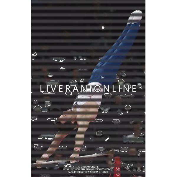 (120730) -- LONDON, July 30, 2012 () -- French gymnast Beny Pierre Yves takes part in Horizontal Bar event during Gymnastics Artistic men\'s team final contest, at London 2012 Olympic Games in London, Britain, on July 30, 2012. The Chinese team won gold medal. (/Wang Jianhua) (nxl) AG ALDO LIVERANI S A S ONLY ITALY