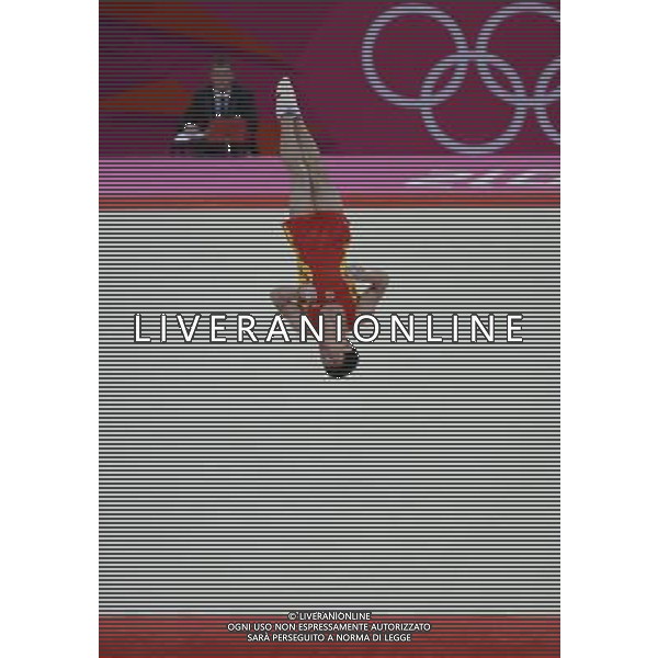 (120730) -- LONDON, July 30, 2012 () -- Chinese gymnast Feng Zhe takes part in Floor event during Gymnastics Artistic men\'s team final contest, at London 2012 Olympic Games in London, Britain, on July 30, 2012. The Chinese team won gold medal. (/Qi Heng) (nxl) AG ALDO LIVERANI S A S ONLY ITALY