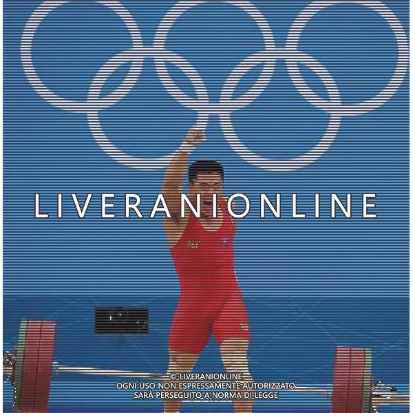 (120730) -- LONDON, July 30, 2012 () -- Kim Un Guk of the Democratic People\'s Republic of Korea celebrates after winning men\'s weightlifting 62kg contest, at London 2012 Olympic Games in London, Britain, on July 30, 2012. Kim Un Guk claimed the title of the event and set a new World Record of total with a weight of 327kg. (/Gong Lei) AG ALDO LIVERANI S A S ONLY ITALY