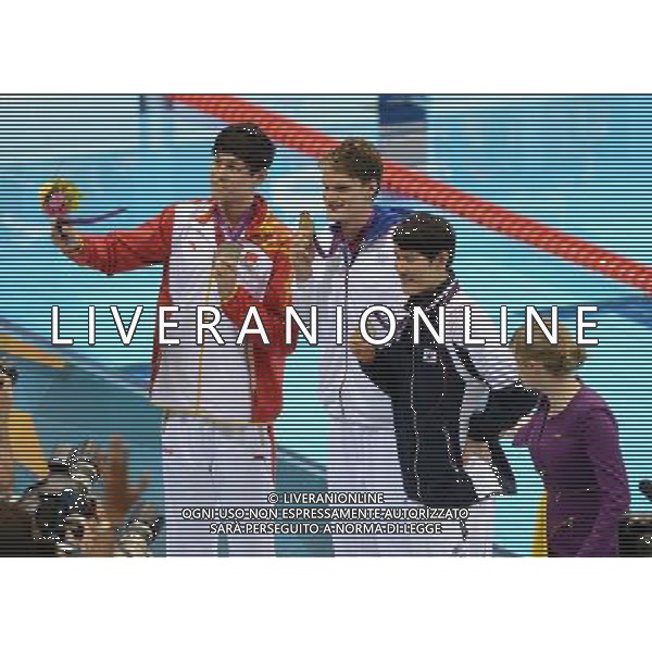 (120730) -- LONDON, July 30, 2012 () -- Yannick Agnel(C) of France, Sun Yang(L) of China, and Park Taehwan of South Korea pose at the awarding ceremony of men\'s 200m freestyle of swimming at the London 2012 Olympic Games in London, Britain, July 30, 2012. Yannick Agnel claimed the title of this event. Sun Yang of China and Park Taehwan of South Korea shared silver medal with 1:44.93. (/Fei Maohua)(zgp). (/Li Gang)(zgp) AG ALDO LIVERANI S A S ONLY ITALY