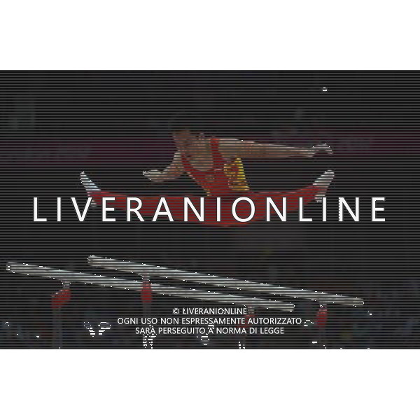 (120730) -- LONDON, July 30, 2012 () -- Chinese gymnast Guo Weiyang takes part in Parallel Bars event during Gymnastics Artistic men\'s team final contest, at London 2012 Olympic Games in London, Britain, on July 30, 2012. The Chinese team won gold medal. (/Wang Jianhua) (nxl) AG ALDO LIVERANI S A S ONLY ITALY