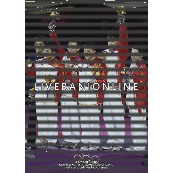 (120730) -- LONDON, July 30, 2012 () -- Chinese gymnasts celebrate during the victory ceremony after Gymnastics Artistic men\'s team final contest, at London 2012 Olympic Games in London, Britain, on July 30, 2012. The Chinese team won gold medal. (/Qi Heng) (nxl) AG ALDO LIVERANI S A S ONLY ITALY