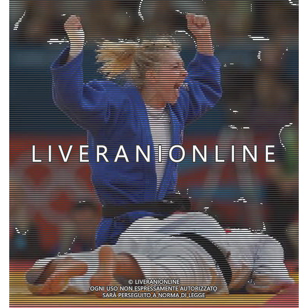 (120730) -- LONDON, July 30, 2012 () -- Automne Pavia of France celebrates after defeating Hedvig Karakas of Hungary in women\'s Judo 57kg bronze medal contest at London 2012 Olympic Games in London, Britain, on July 30, 2012. Automne Pavia of France won bronze medal. (/Chen Xiaowei) (nxl) AG ALDO LIVERANI S A S ONLY ITALY