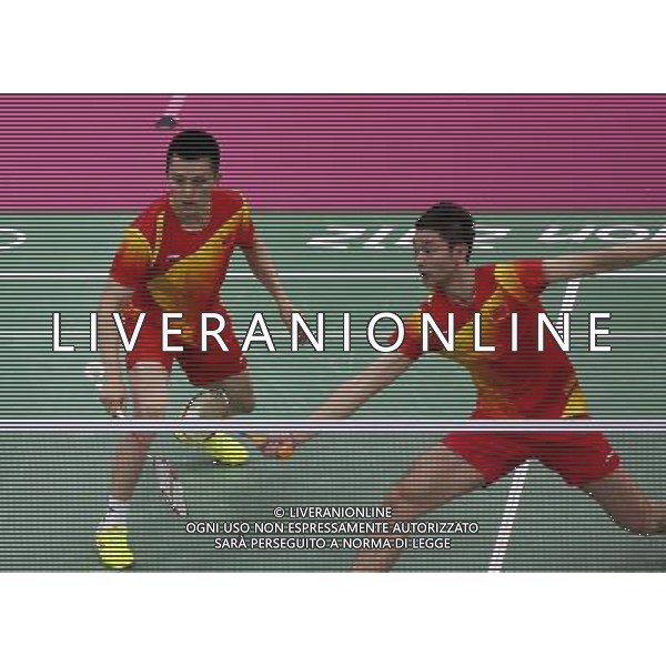 (120731) -- LONDON, July 31, 2012 () -- Chai Biao and Guo Zhendong of China compete during men\'s badminton doubles group play stage match, at London 2012 Olympic Games in London, Britain, on July 31, 2012. Mathias Boe and Carsten Mogensen of Denmark defeated Chai Biao/Guo Zhendong of China 2-0. (/Tang Shi) (nxl) ©photoshot/AGENZIA ALDO LIVERANI SAS - ITALY ONLY - Giochi Olimpici - Olimpiadi Londra 2012