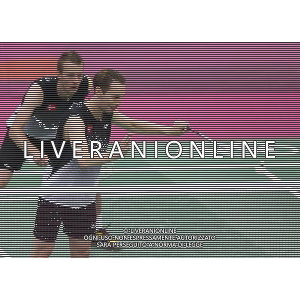 (120731) -- LONDON, July 31, 2012 () -- Mathias Boe and Carsten Mogensen of Denmark compete during men\'s badminton doubles group play stage match, at London 2012 Olympic Games in London, Britain, on July 31, 2012. Mathias Boe and Carsten Mogensen of Denmark defeated Chai Biao/Guo Zhendong of China 2-0. (/Tang Shi) (nxl) ©photoshot/AGENZIA ALDO LIVERANI SAS - ITALY ONLY - Giochi Olimpici - Olimpiadi Londra 2012