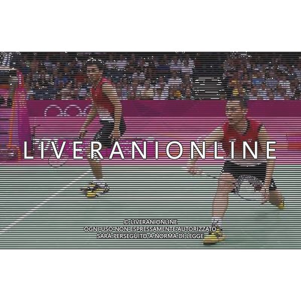 (120731) -- LONDON, July 31, 2012 () -- Ahsan M/Seprano B of Indonesia compete during men\'s badminton doubles preliminary contest, at London 2012 Olympic Games in London, Britain, on July 31, 2012. Ahsan M/Seprano B of Indonesia defeated Ko SH/Yoo YS of South Korea 2-0. (/Tang Shi) (nxl) ©photoshot/AGENZIA ALDO LIVERANI SAS - ITALY ONLY - Giochi Olimpici - Olimpiadi Londra 2012