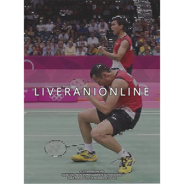 (120731) -- LONDON, July 31, 2012 () -- Ahsan M/Seprano B of Indonesia compete during men\'s badminton doubles preliminary contest, at London 2012 Olympic Games in London, Britain, on July 31, 2012. Ahsan M/Seprano B of Indonesia defeated Ko SH/Yoo YS of South Korea 2-0. (/Tang Shi) (nxl) ©photoshot/AGENZIA ALDO LIVERANI SAS - ITALY ONLY - Giochi Olimpici - Olimpiadi Londra 2012