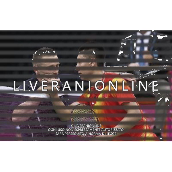 (120731) -- LONDON, July 31, 2012 () -- Chen Jin of China (L) interacts with Przemyslaw Wacha of Poland during men\'s badminton singles preliminary match, at London 2012 Olympic Games in London, Britain, on July 31, 2012. Chen Jin of China defeated Przemyslaw Wacha of Poland 2-0. (/Tang Shi) (nxl) ©photoshot/AGENZIA ALDO LIVERANI SAS - ITALY ONLY - Giochi Olimpici - Olimpiadi Londra 2012