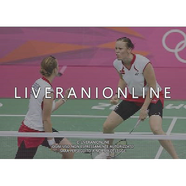 (120731) -- LONDON, July 31, 2012 () -- Kamilla Rytter Juhl and Christinna Pedersen of Denmark interact during women\'s badminton doubles group play stage match, at London 2012 Olympic Games in London, Britain, on July 31, 2012. Kamilla Rytter Juhl and Christinna Pedersen of Denmark defeated Tian Qing and Zhao Yunlei of China 2-0. (/Tang Shi) (nxl) ©photoshot/AGENZIA ALDO LIVERANI SAS - ITALY ONLY - Giochi Olimpici - Olimpiadi Londra 2012