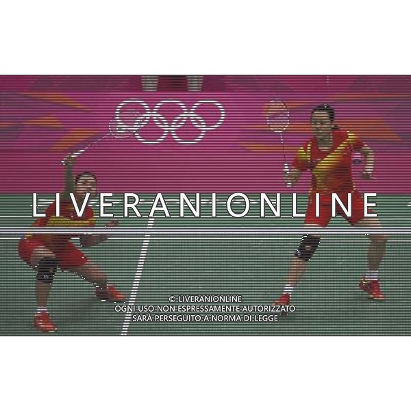 (120731) -- LONDON, July 31, 2012 () -- Tian Qing and Zhao Yunlei of China compete during women\'s badminton doubles group play stage match, at London 2012 Olympic Games in London, Britain, on July 31, 2012. Kamilla Rytter Juhl and Christinna Pedersen of Denmark defeated Tian Qing and Zhao Yunlei of China 2-0. (/Tang Shi) (nxl) ©photoshot/AGENZIA ALDO LIVERANI SAS - ITALY ONLY - Giochi Olimpici - Olimpiadi Londra 2012