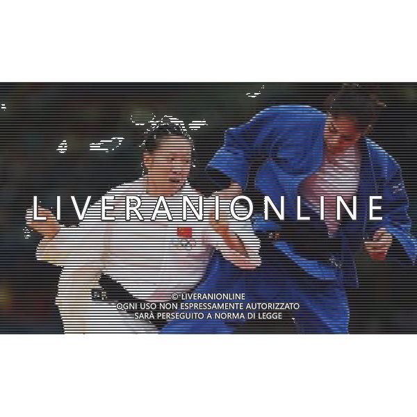 (120731) -- LONDON, July 31, 2012 () -- Xu Lili of China (in white) competes with Mariana Silva of Brazil during women\'s Judo 63kg elimination round of 32 contest, at London 2012 Olympic Games in London, Britain, on July 31, 2012. Xu Lili of China defeated Mariana Silva of Brazil. (/Wu Xiaoling) (nxl) ©photoshot/AGENZIA ALDO LIVERANI SAS - ITALY ONLY - Giochi Olimpici - Olimpiadi Londra 2012