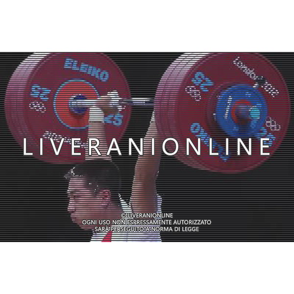 (120731) -- LONDON, July 31, 2012 () -- Kim Myong Hyok of the Democratic People\'s Republic of Korea participates in men\'s weightlifting 69kg group B contest, at London 2012 Olympic Games in London, Britain, on July 31, 2012. Kim Myong Hyok ranks first in Group B with a total weight of 329kg. (/Chen Jianli) (nxl) ©photoshot/AGENZIA ALDO LIVERANI SAS - ITALY ONLY - Giochi Olimpici - Olimpiadi Londra 2012