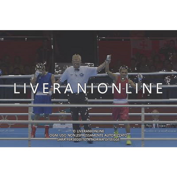 Devendro Singh Laishram (Red) from India wins his bout against Bayron Molina Figueroa (Blue) from Honduras seen during Men\'s Light Fly (49kg) Mens Boxing London 2012 Olympic Games held at the Excel. London /ALDO LIVERANI SAS-ITALY ONLY - EDITORIAL USE ONLY