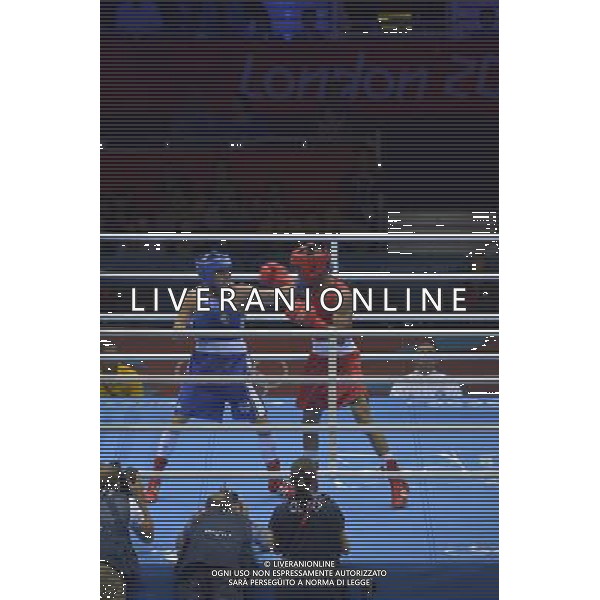 Roniel Iglesias Sotolongo (Red) from Cuba wins his bout against Cesar Villarraga Aldana (Blue) from Columbia seen during Men\'s Light Welter (64kg) Mens Boxing London 2012 Olympic Games held at the Excel. London /ALDO LIVERANI SAS-ITALY ONLY - EDITORIAL USE ONLY