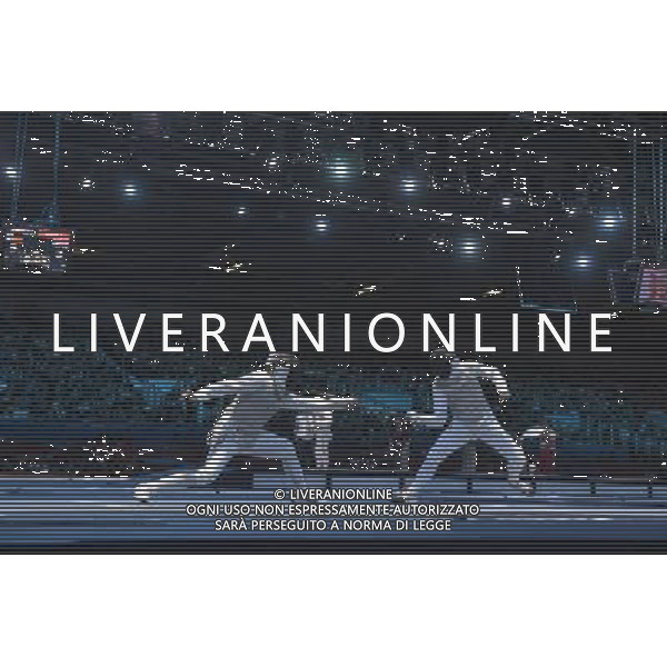Renal Ganeev from Russia against Sebastian Bachmann from Germany seen during Men\'s Individual Foil event London 2012 Olympic Games held at the Excel. London olympics stadium /ALDO LIVERANI SAS-ITALY ONLY - EDITORIAL USE ONLY