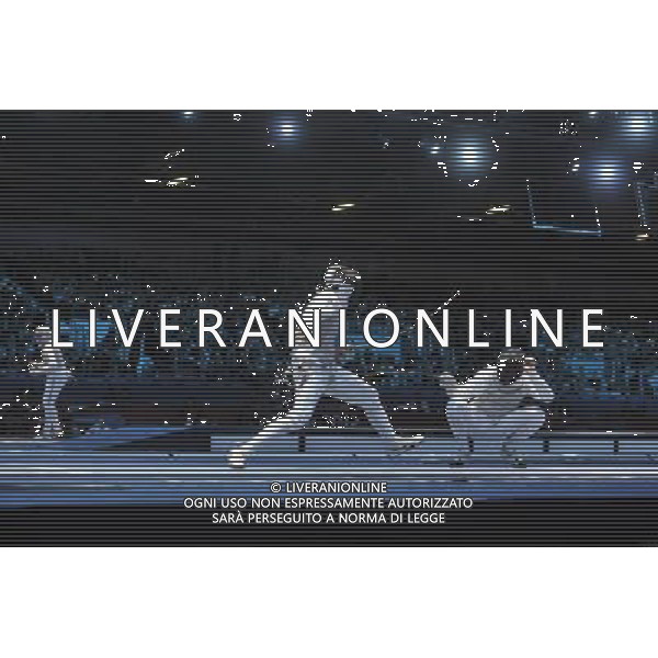 Renal Ganeev from Russia against Sebastian Bachmann from Germany seen during Men\'s Individual Foil event London 2012 Olympic Games held at the Excel. London olympics stadium /ALDO LIVERANI SAS-ITALY ONLY - EDITORIAL USE ONLY