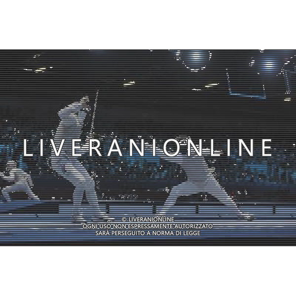 Renal Ganeev from Russia against Sebastian Bachmann from Germany seen during Men\'s Individual Foil event London 2012 Olympic Games held at the Excel. London olympics stadium /ALDO LIVERANI SAS-ITALY ONLY - EDITORIAL USE ONLY