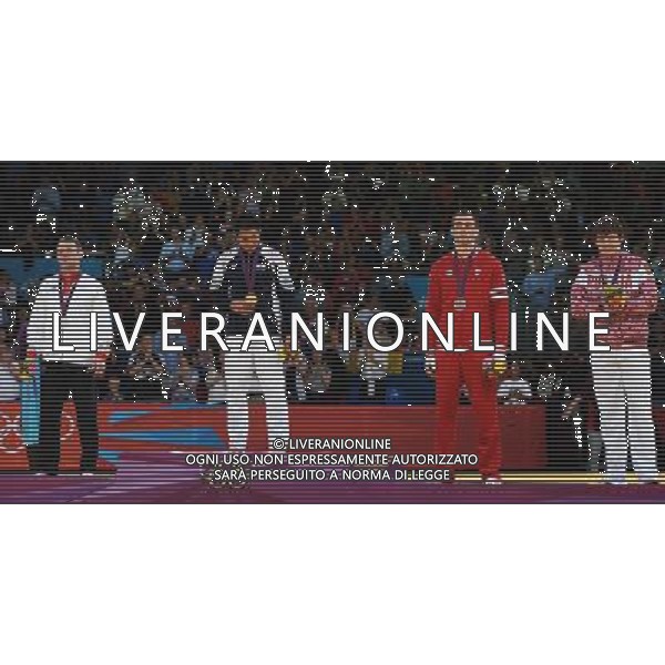 (120731) -- LONDON, July 31, 2012 () -- Gold medalist Kim Jae-Bum of South Korea (2nd L), silver medalist Ole Bischof of Germany (1st L) and bronze medalists Antoine Valois-Fortier of Canada (3rd L) and Ivan Nifontov of Russia attend victory ceremony of men\'s Judo 81kg competition, at London 2012 Olympic Games in London, Britain, on July 31, 2012. (/Wu Xiaoling) (nxl) /ALDO LIVERANI SAS-ITALY ONLY - EDITORIAL USE ONLY