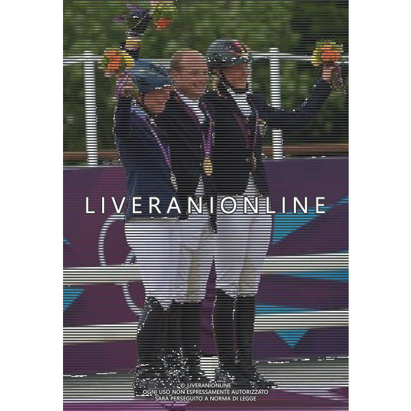 (120731) -- LONDON, July 31, 2012 () -- Michael Jung of Germany£ÂSara Algotsson Ostholt of Sweden, and Sandra Auffarth of Germany pose at the awarding ceremony of equestrian individual eventing at the London 2012 Olympic Games in London, Britain, July 31, 2012. (/Gesang Dawa)(zgp) /ALDO LIVERANI SAS-ITALY ONLY - EDITORIAL USE ONLY