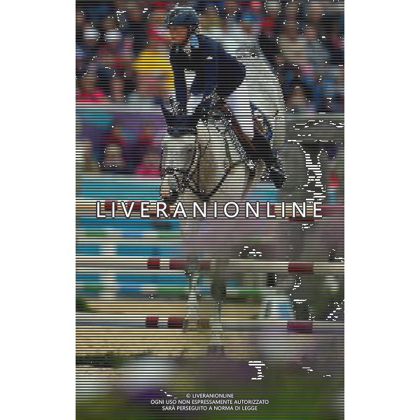 (120731) -- LONDON, July 31, 2012 () -- Sara Algotsson Ostholt of Sweden competes in jumping of equestrian individual eventing at the London 2012 Olympic Games in London, Britain, July 31, 2012. Sara Algotsson Ostholt won silver medal in individual eventing. (/Gesang Dawa)(zgp) /ALDO LIVERANI SAS-ITALY ONLY - EDITORIAL USE ONLY