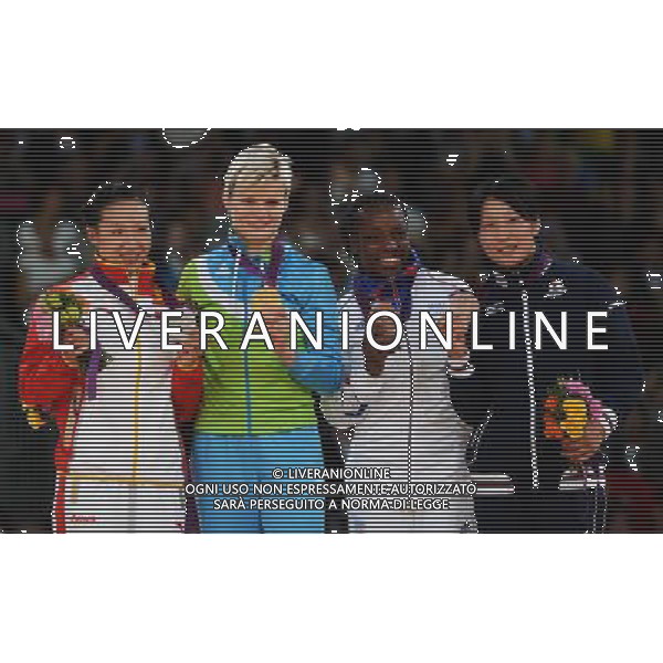 (120731) -- LONDON, July 31, 2012 () -- Gold medalist Urska Zolnir of Slovenia (2nd L), silver medalist Xu Lili of China (1st L), bronze medalists Gevrise Emane of France (3rd L) and Yoshie Ueno of Japan attend victory ceremony of women\'s Judo 63kg competition, at London 2012 Olympic Games in London, Britain, on July 31, 2012. (/Wu Xiaoling) (nxl) /ALDO LIVERANI SAS-ITALY ONLY - EDITORIAL USE ONLY