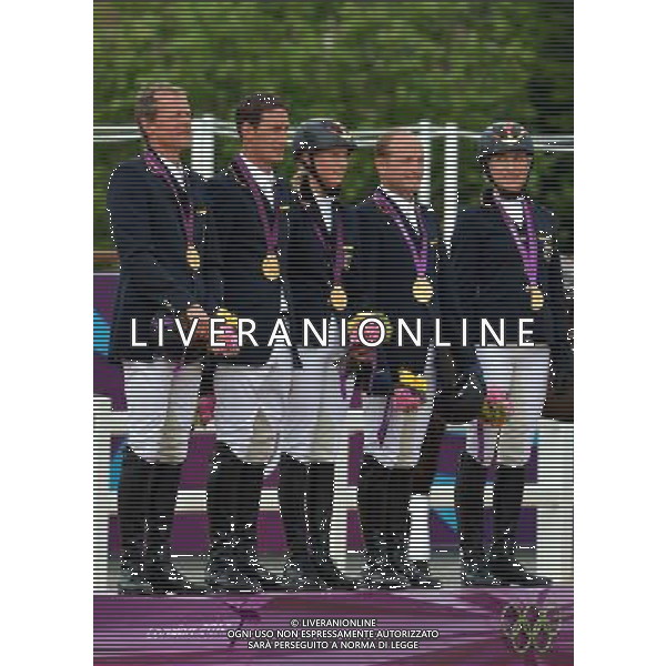 (120731) -- LONDON, July 31, 2012 () -- The teams of Germany attend the awarding ceremony of equestrian team eventing at the London 2012 Olympic Games in London, Britain, July 31, 2012. German team claimed the title of this event. (/Gesang Dawa)(zgp) /ALDO LIVERANI SAS-ITALY ONLY - EDITORIAL USE ONLY