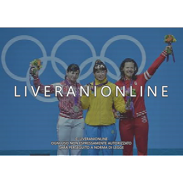 (120731) -- LONDON, July 31, 2012 () -- Gold medalist Maiya Maneza of Kazakhstan (C), silver medalist Svetlana Tsarukaeva of Russia (L) and bronze medalist Christine Girard of Canada pose for pictures during victory ceremony of women\'s weightlifting 63kg competition, at London 2012 Olympic Games in London, Britain, on July 31, 2012. (/Gong Lei) (nxl) /ALDO LIVERANI SAS-ITALY ONLY - EDITORIAL USE ONLY